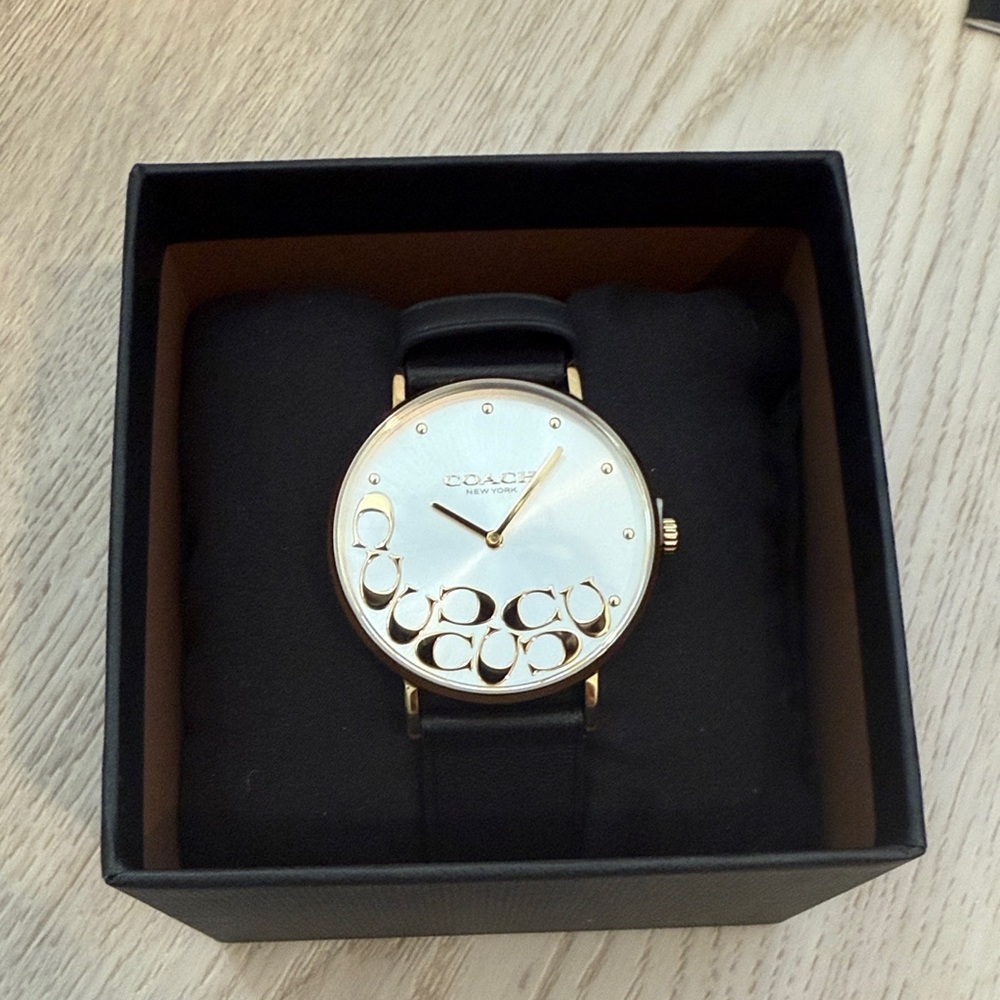 Coach Women's Gold and Black Watch